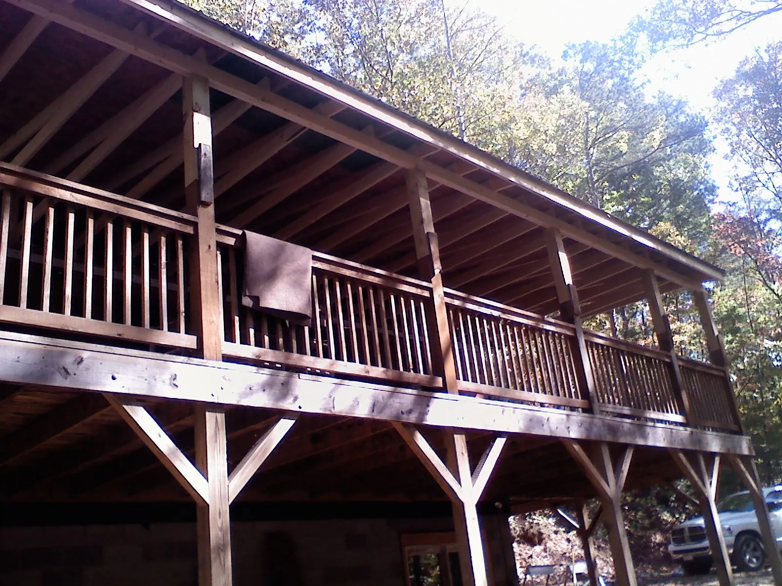 Timber framing under a new elevated porch and deck — Roof Leak Repair in Minco by Roofing Brothers